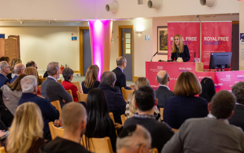 An audience watching a lecture hosted by the Royal Free Charity.