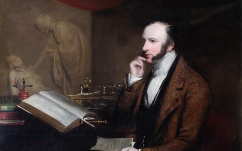 An old portrait in very dark tones depicting Dr William Marsden looking studious.