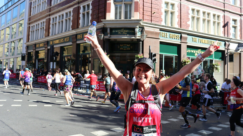 One of our fantastic TCL London Marathon charity runners, Natalie, during the 2022 race. 