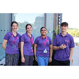 Four young volunteers stood outside the Royal Free Hospital