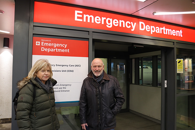 Two people stood beside each other outside the Royal Free Hospitals A&E department